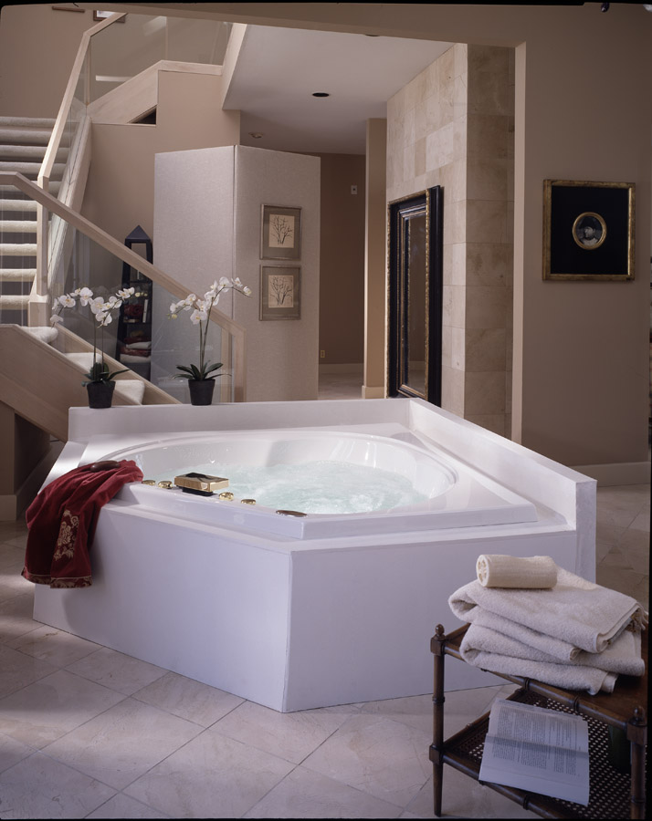 Before: bath with staircase and white tub surround